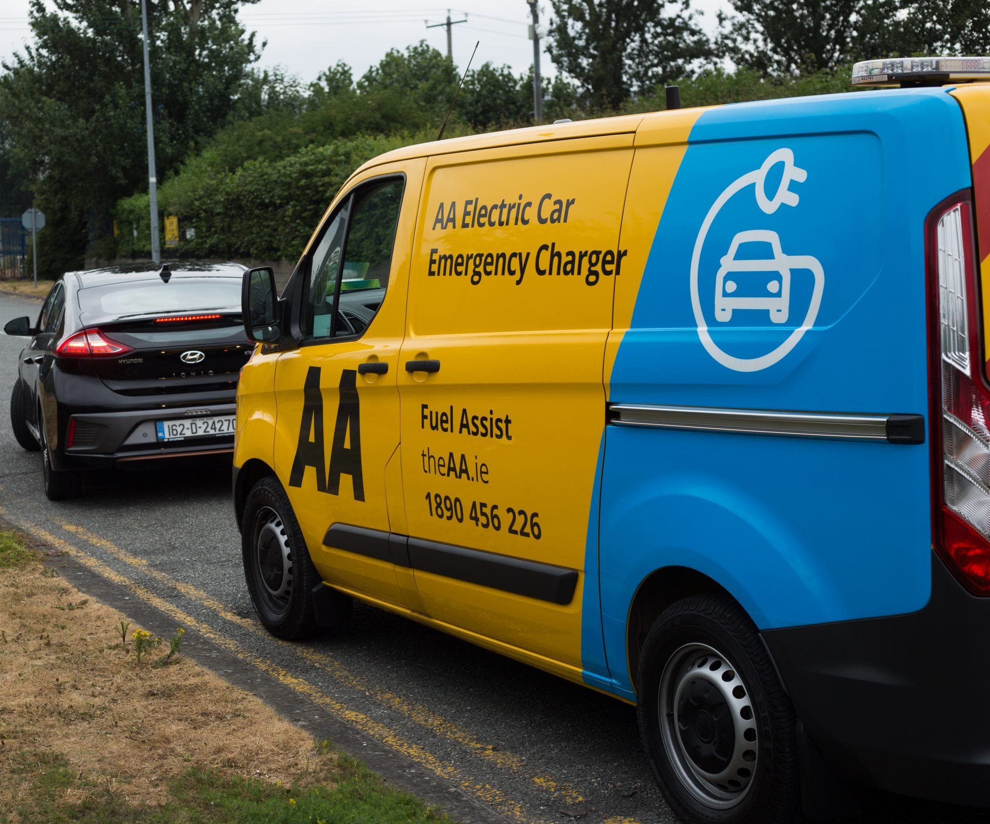 One of the AA's portable charger vans on the roadside, marked AA Electric Car Emergency Charger